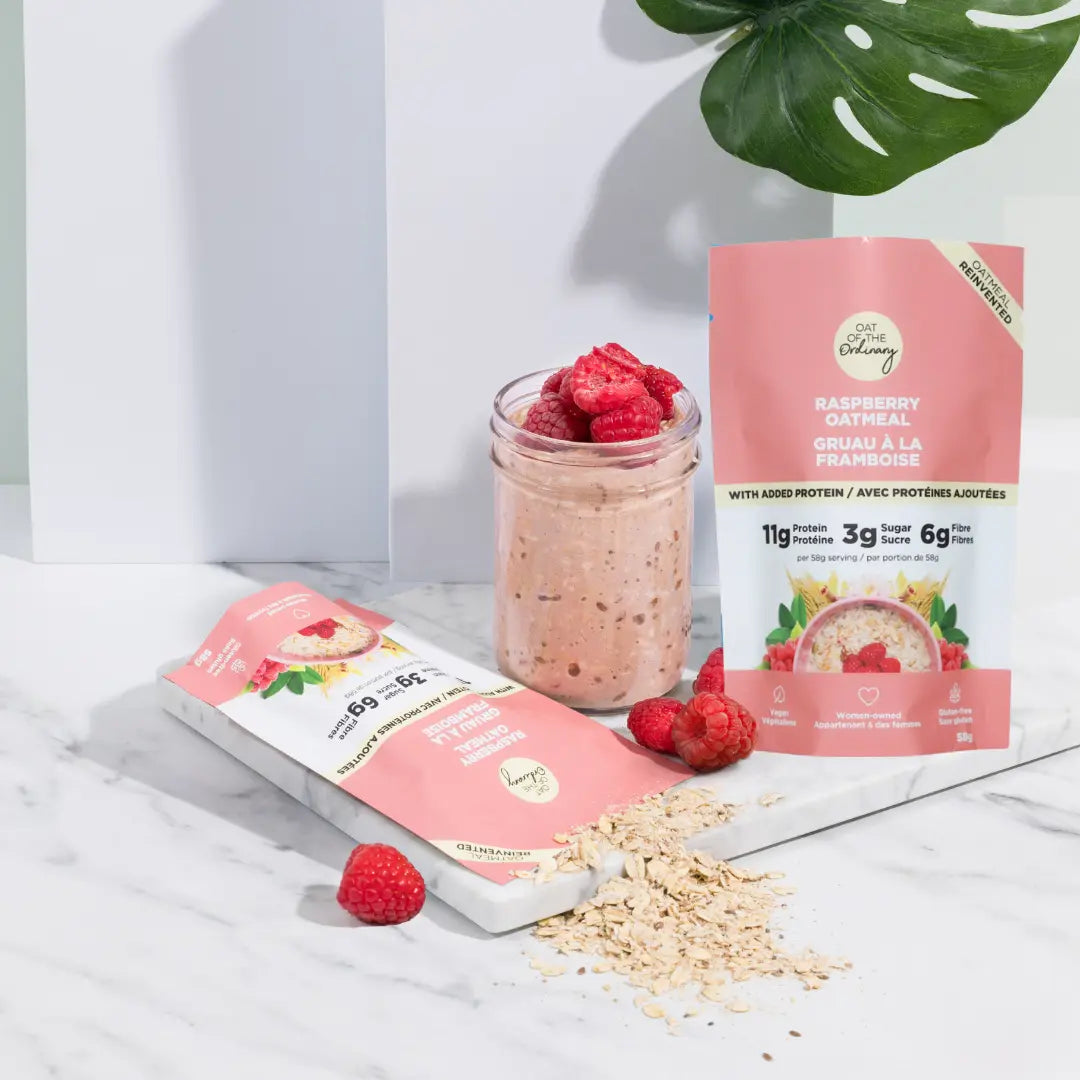 Single-serve raspberry protein oatmeal pouches with a jar of raspberry overnight oats.