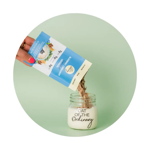 Overnight oatmeal in a mason jar with plant-based milk.